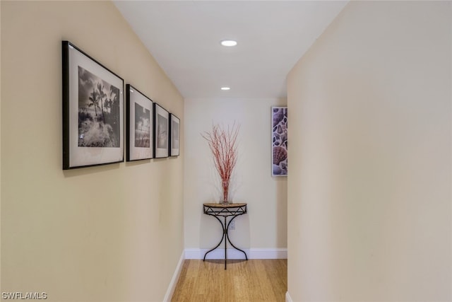 corridor featuring light hardwood / wood-style floors