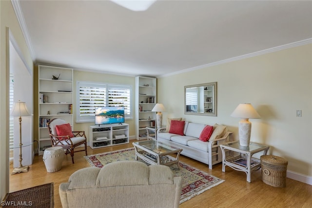 living room with ornamental molding and light hardwood / wood-style flooring