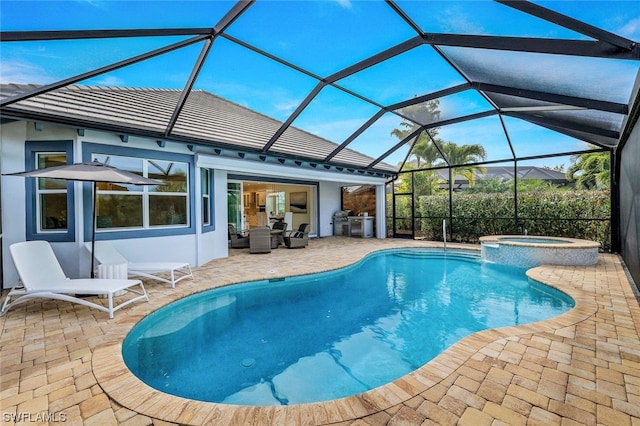 view of pool with an outdoor hangout area, a lanai, an in ground hot tub, and a patio area