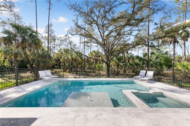 view of swimming pool featuring a fenced in pool and fence