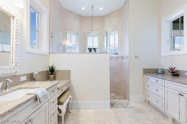 bathroom featuring vanity and tile floors