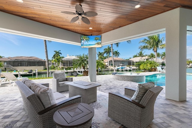 view of patio / terrace with an outdoor hangout area and ceiling fan