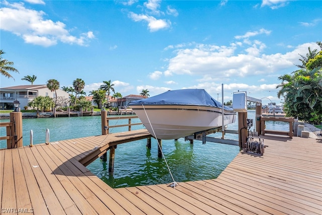 view of dock with a water view