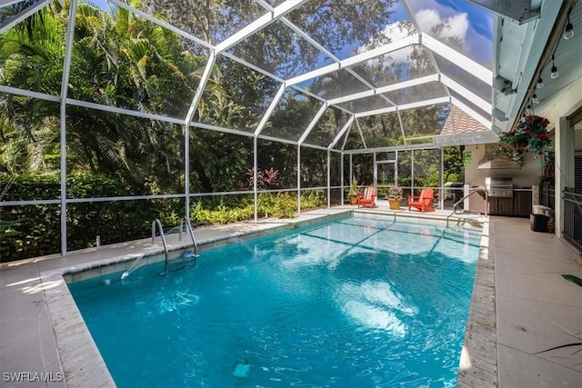 view of swimming pool with area for grilling, a patio area, glass enclosure, and a grill