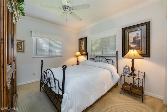 bedroom with ceiling fan, crown molding, and light carpet