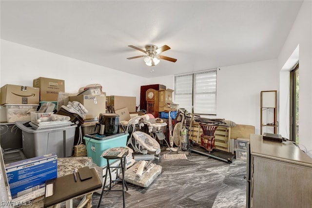 storage room with a ceiling fan