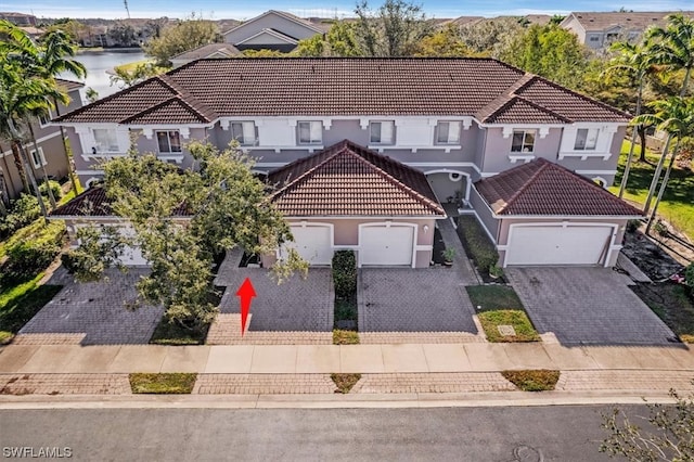 view of front of property with a water view