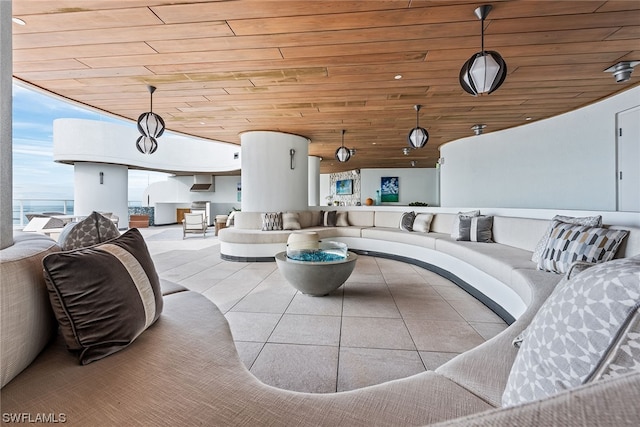 tiled living room featuring wood ceiling