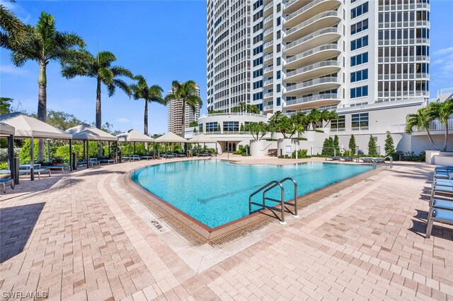 view of swimming pool with a gazebo and a patio