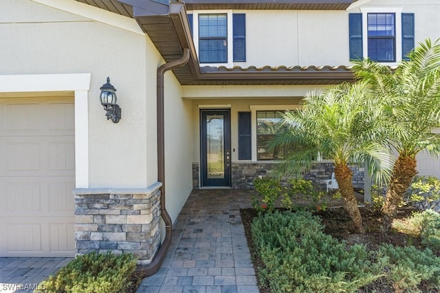 entrance to property with a garage