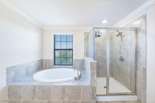 bathroom with shower with separate bathtub and ornamental molding