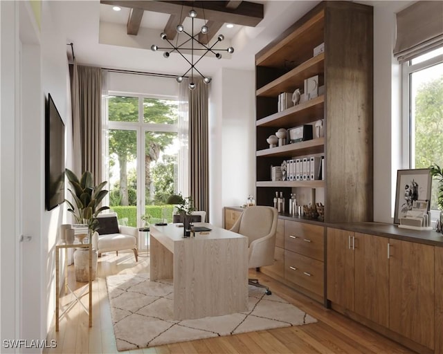 office area with beam ceiling, light wood-style flooring, and a notable chandelier