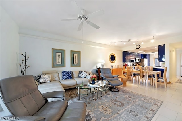 living room featuring ceiling fan, track lighting, and light tile floors