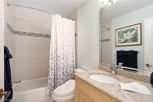 full bathroom featuring toilet, shower / tub combo with curtain, and oversized vanity