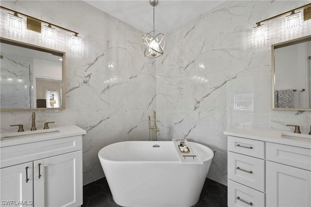 bathroom with vanity, a bath, and tile walls