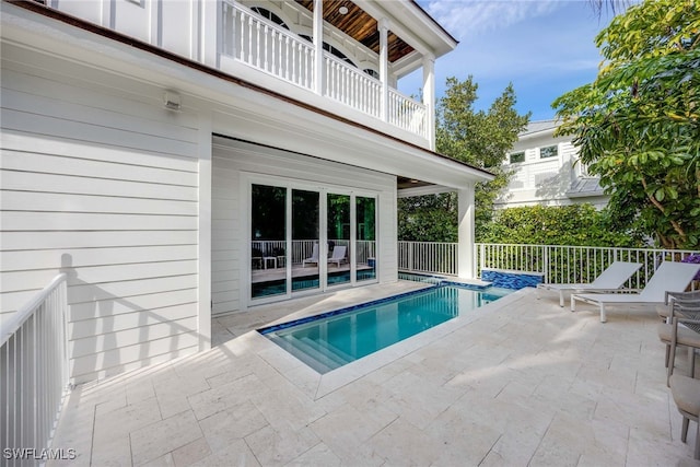 view of pool with a patio area