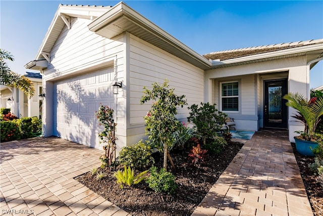 exterior space featuring a garage