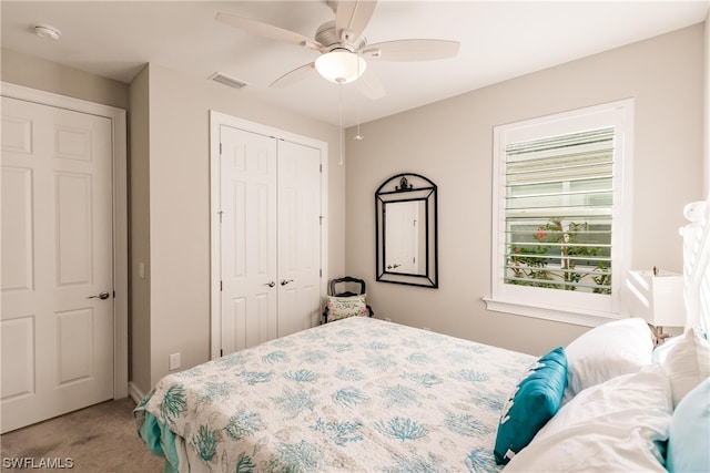 carpeted bedroom with ceiling fan