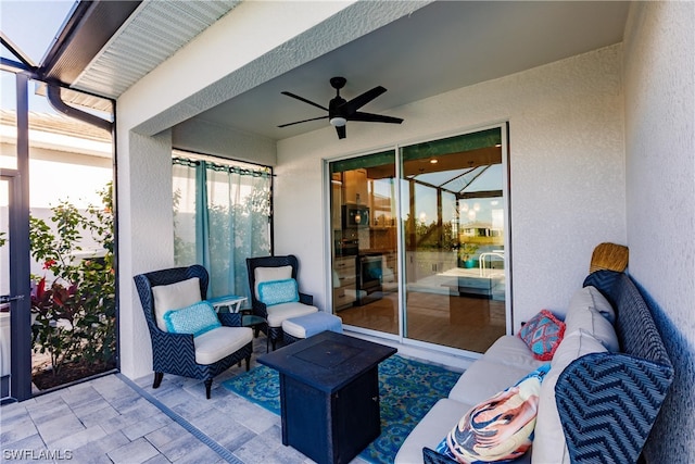 view of terrace featuring ceiling fan