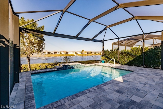 view of pool with a patio area, pool water feature, and a lanai