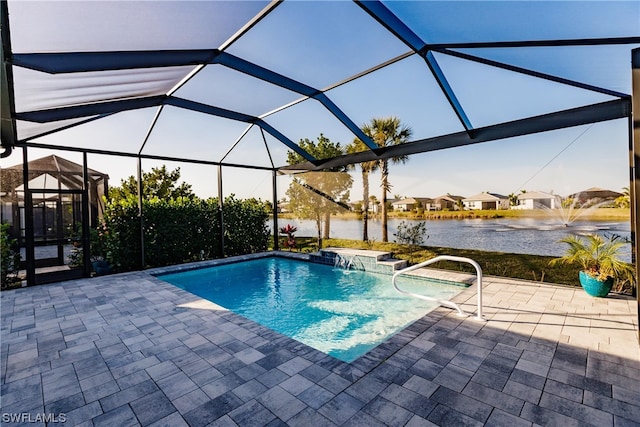 view of swimming pool featuring glass enclosure, a patio area, and pool water feature