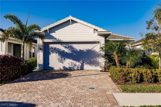 view of front of home with a garage