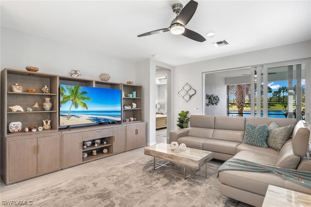 living room with ceiling fan