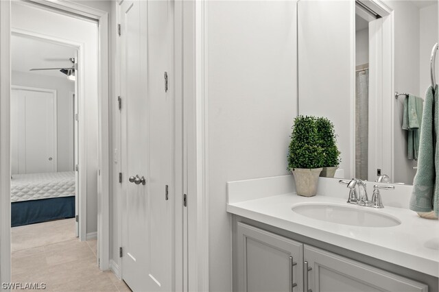 bathroom with vanity and tile patterned flooring