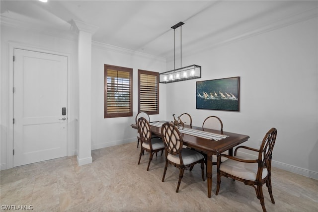 tiled dining space featuring a chandelier and crown molding