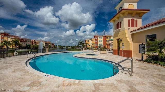 view of pool featuring a patio area