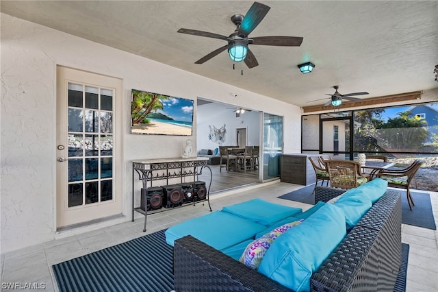 view of patio / terrace featuring outdoor lounge area and ceiling fan