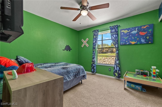 bedroom featuring carpet and ceiling fan