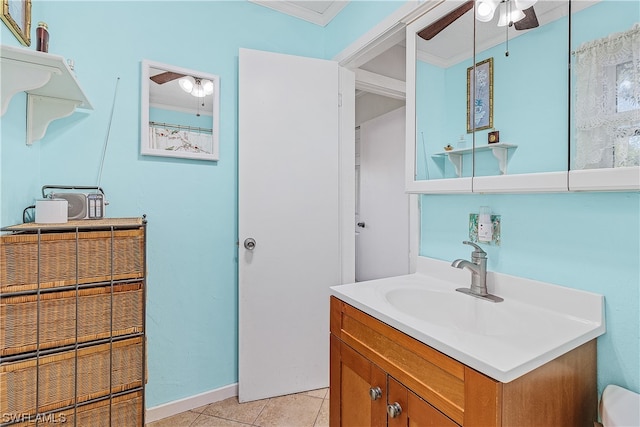 bathroom featuring vanity, tile patterned floors, ceiling fan, and ornamental molding