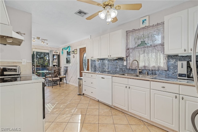 kitchen with white dishwasher, ceiling fan, sink, white cabinetry, and light tile patterned flooring