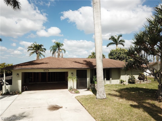 ranch-style home with a front yard