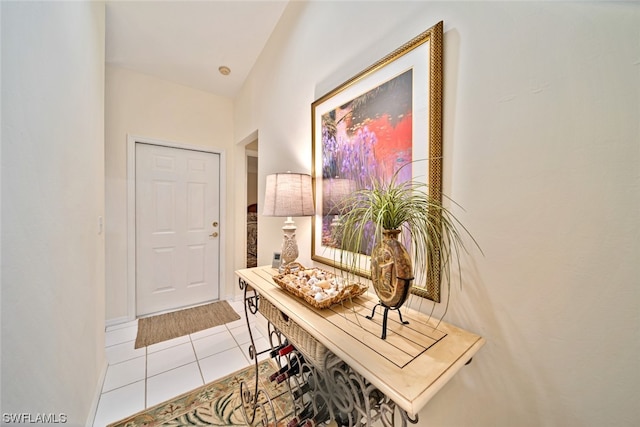 interior space featuring light tile floors