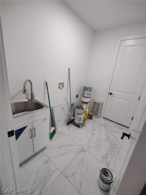 interior space featuring sink and tile floors