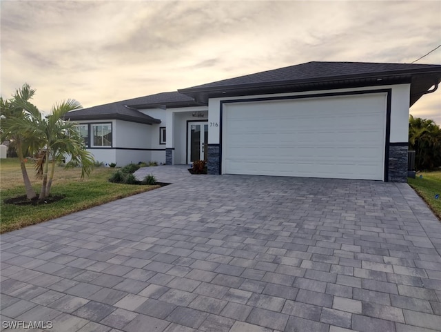 view of front of house with a garage