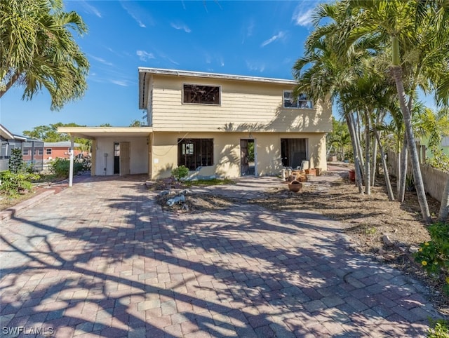 view of front of home featuring a carport