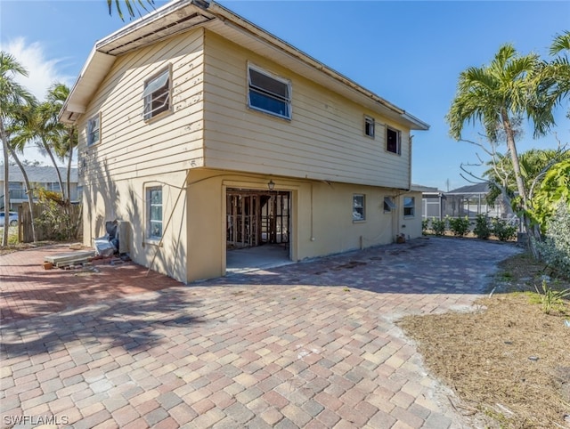 back of house featuring a patio