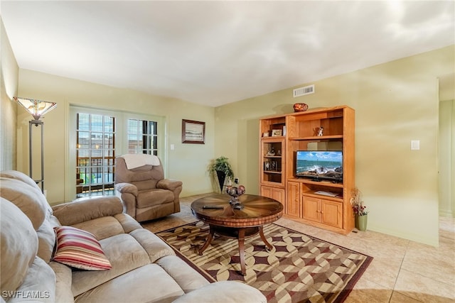 living room featuring light tile patterned flooring