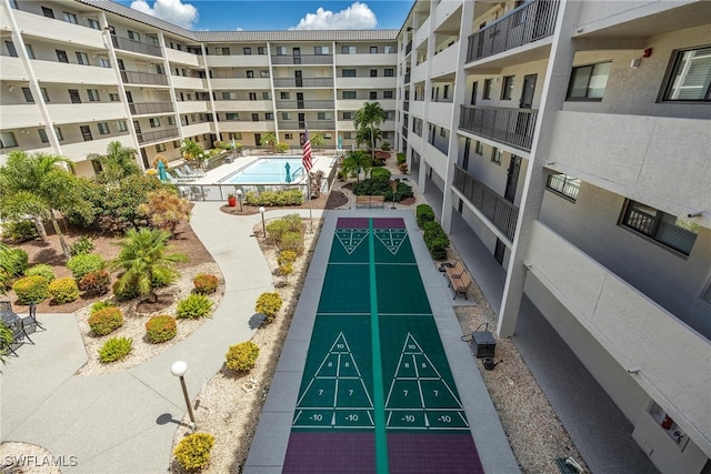 view of property's community featuring a pool