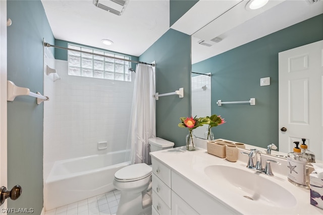 full bathroom with vanity, tile flooring, shower / tub combo with curtain, and toilet