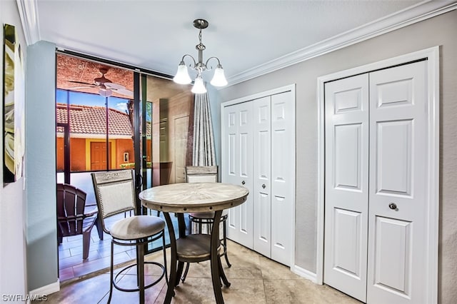 tiled dining area featuring ornamental molding and ceiling fan with notable chandelier