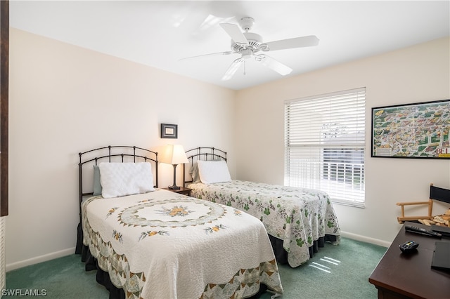 carpeted bedroom featuring multiple windows and ceiling fan