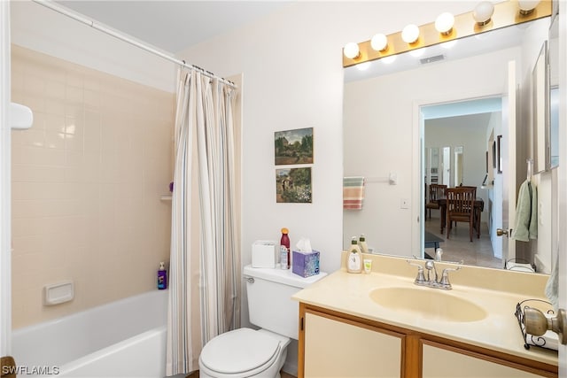 full bathroom featuring toilet, shower / bathtub combination with curtain, and vanity