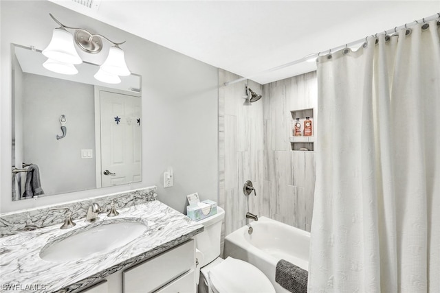 full bathroom with shower / bath combo with shower curtain, toilet, and vanity