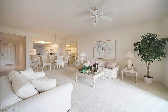 living room with light carpet and ceiling fan