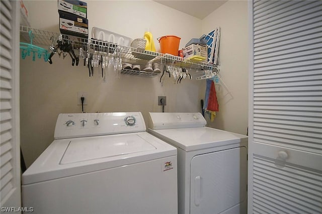 washroom featuring hookup for an electric dryer and washing machine and dryer