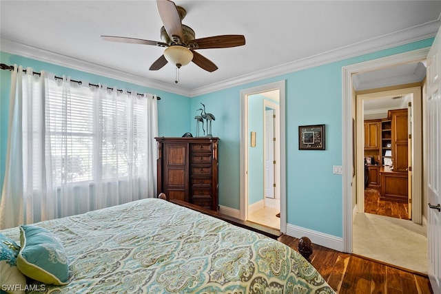 tiled bedroom with ceiling fan and ornamental molding